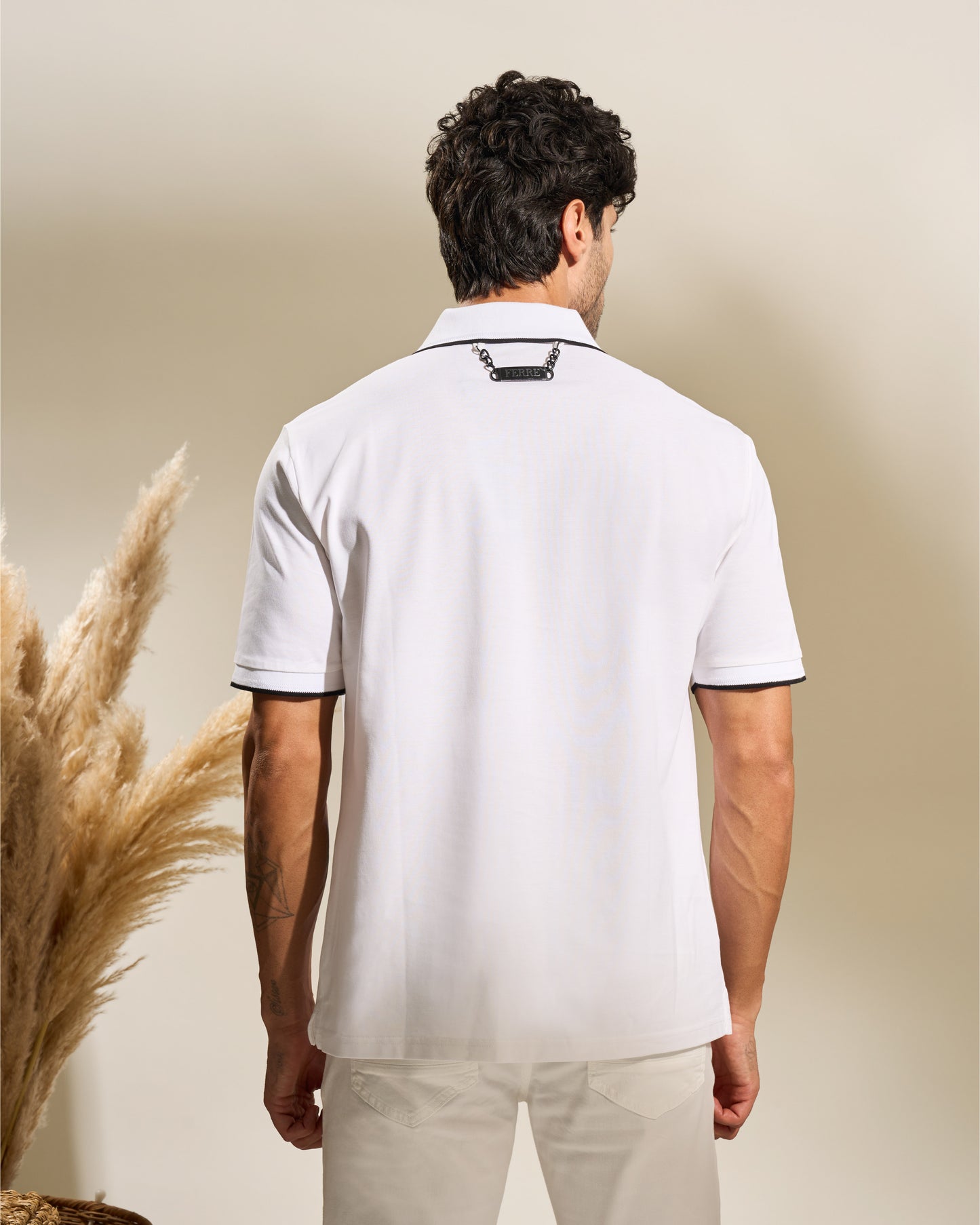 Edgy Back Chain White Polo