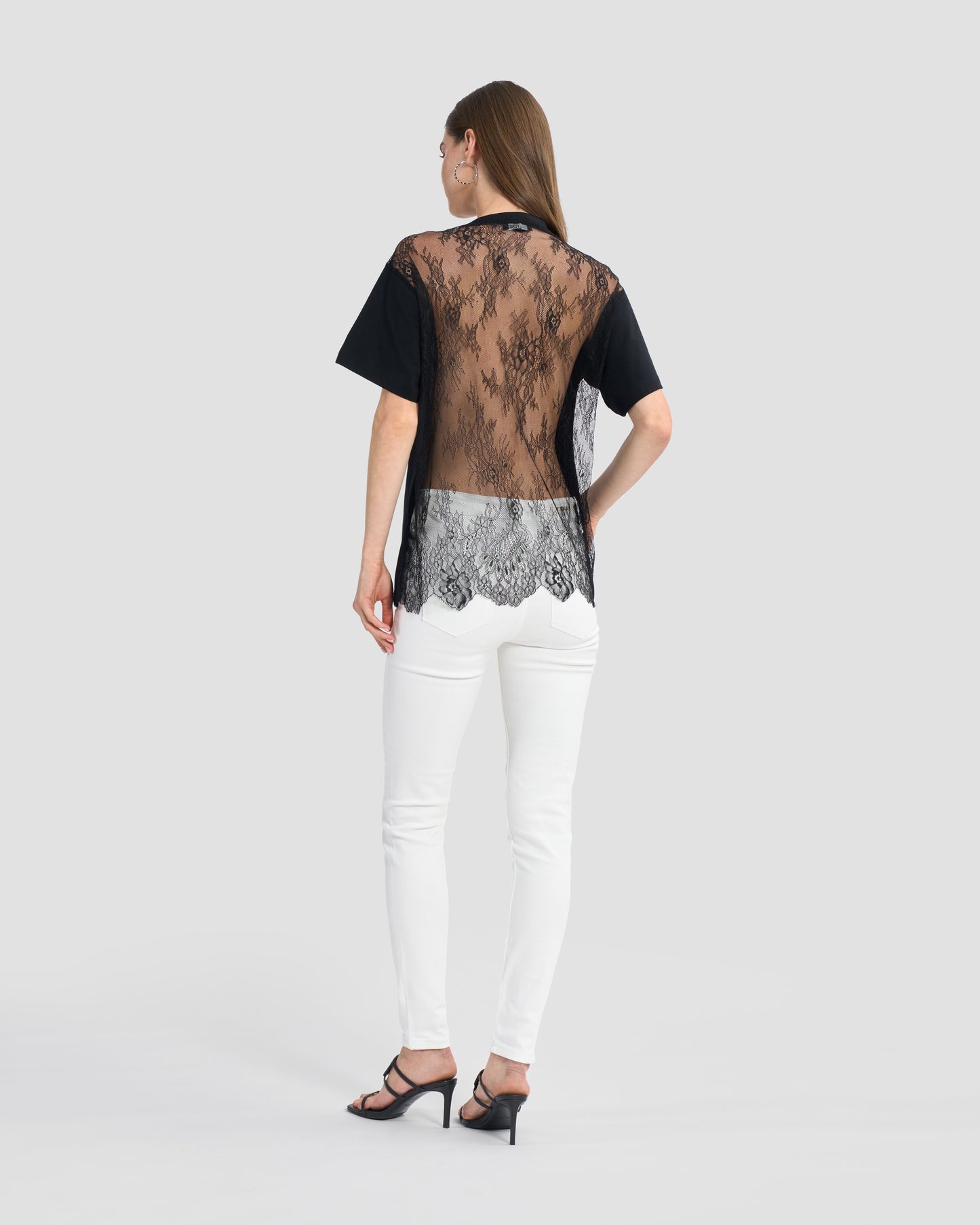 Round neck black t-shirt with lace back and finished off with a beaded Ferré to front.