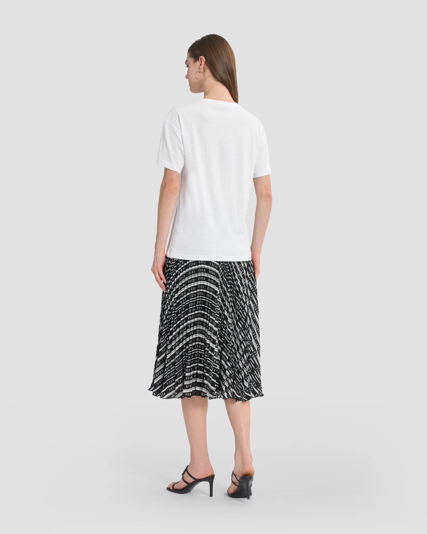 Round neck white t-shirt with beaded Ferré branding to the front finished off with lace detailing.