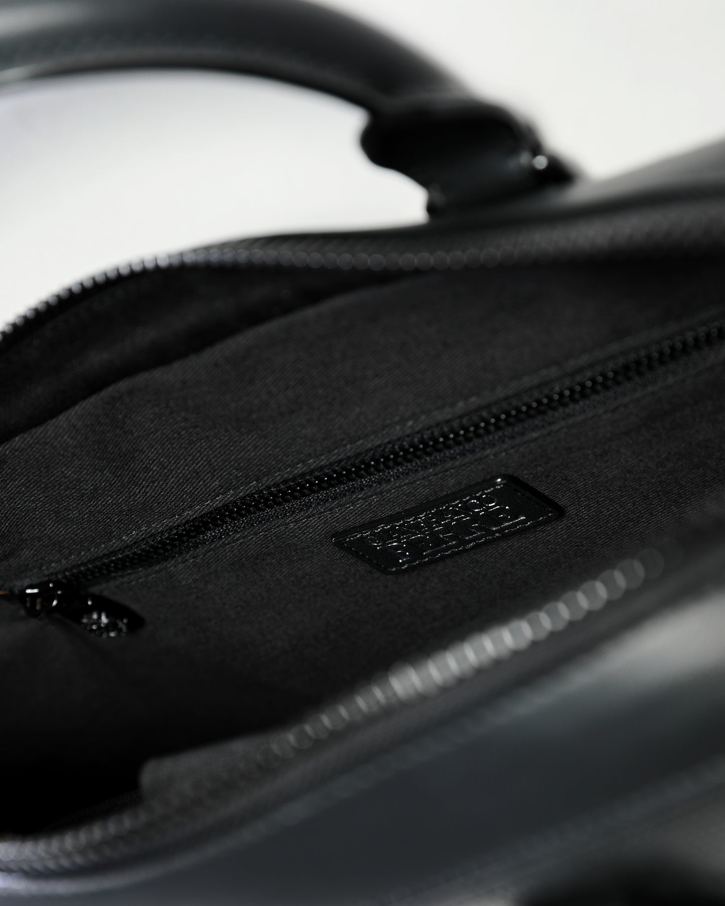 Debossed Monogram Handbag