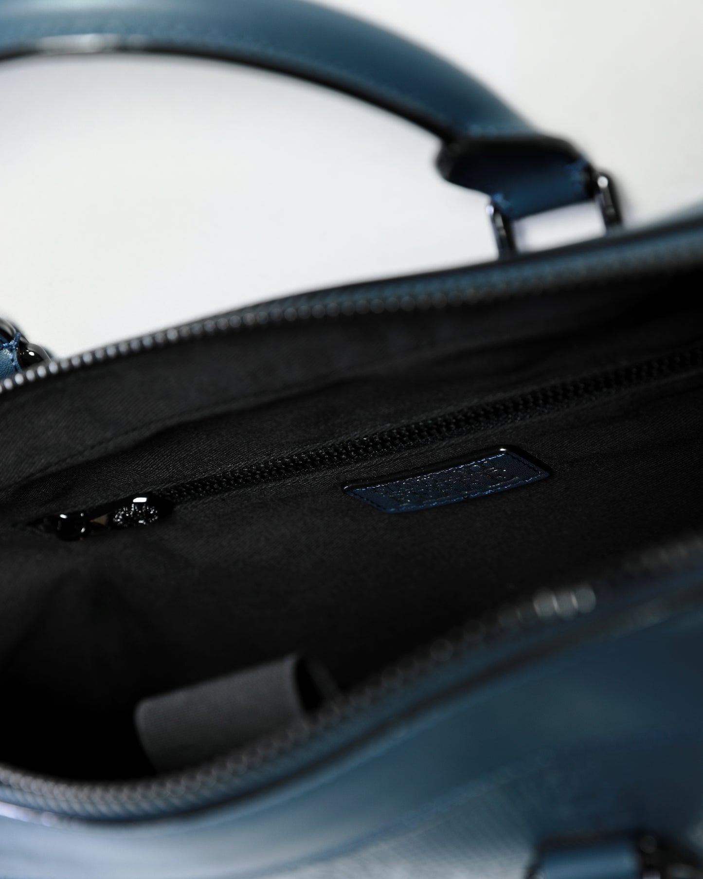 Debossed Monogram Handbag