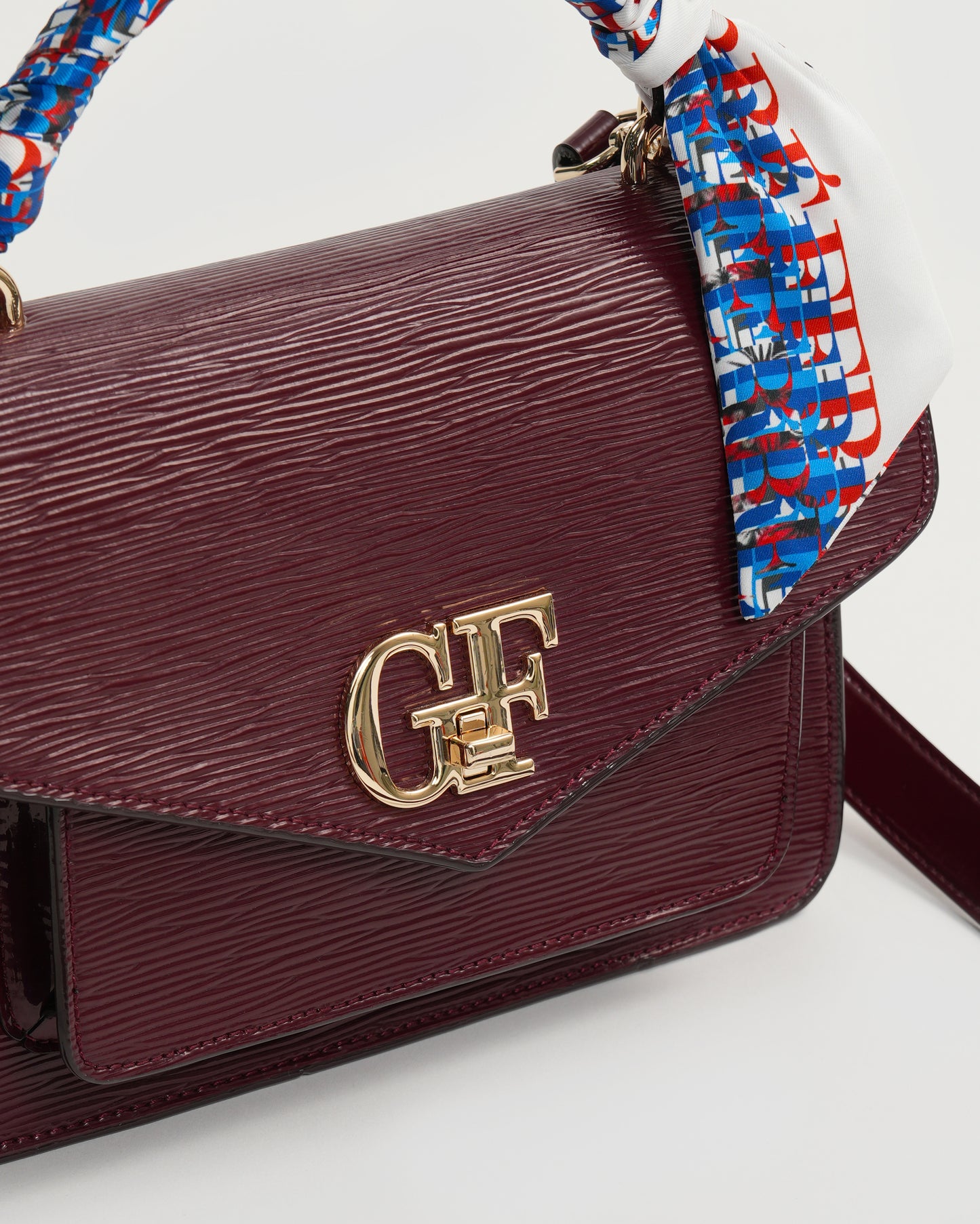 Maroon Textured Leather Handbag
